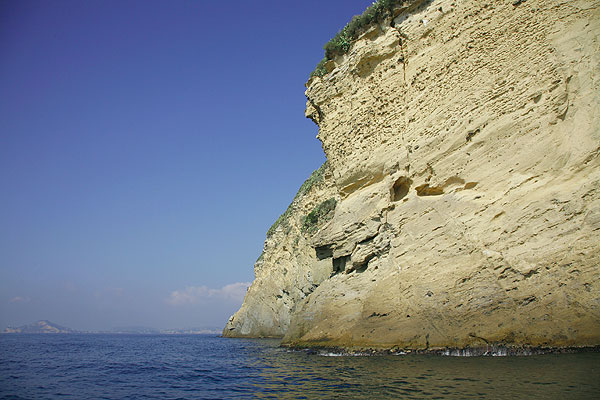 Posillipo Cape's white cliffs made of tuff from the Phegrean Fields volcanoes