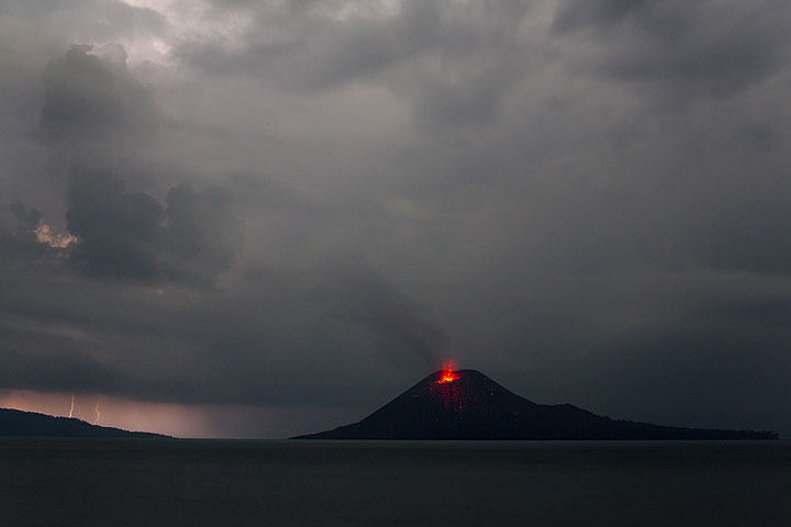 Anak Krakatau with a thunderstorm approaching
