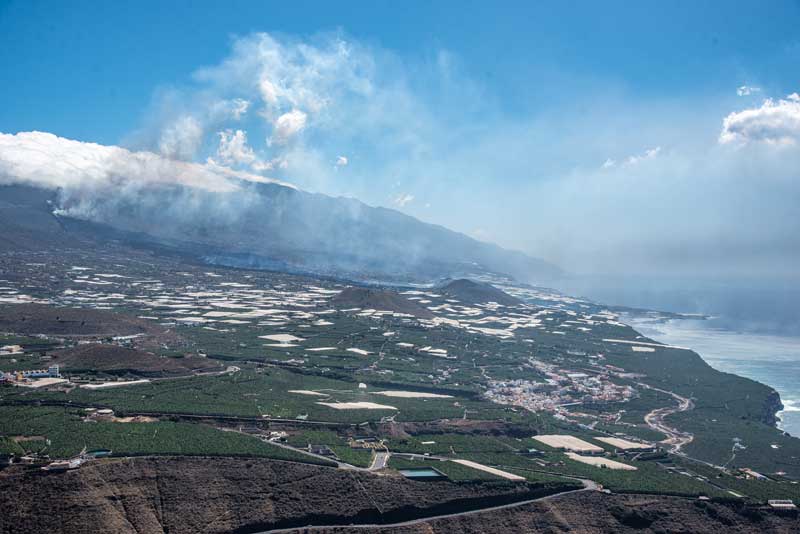 View of the area with the vent (l) and the lava flow into the sea