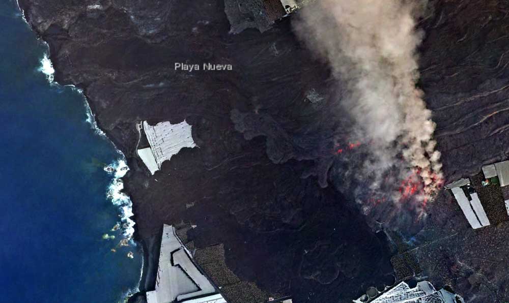 Lava flows descending the cliff onto the coastal flat at Las Hoyas (image: Government of La Palma/ opendatalapalma.es)