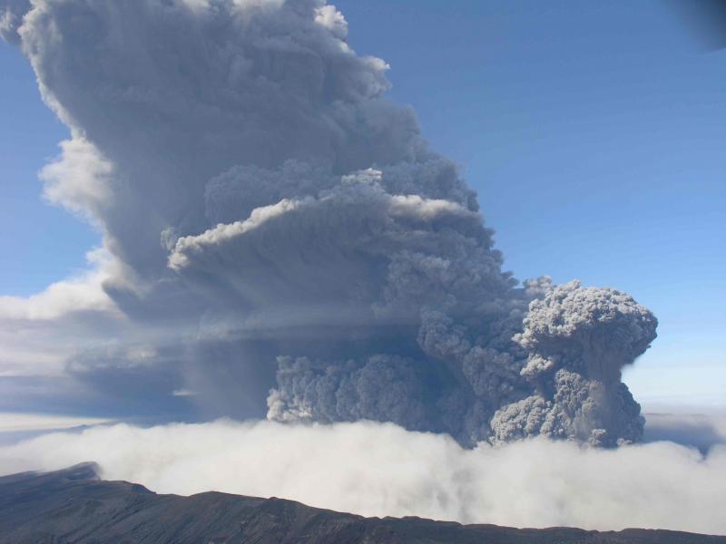 View of Okmok's ash plume emitting from multiple vents near intracaldera Cone D, taken at about 1:30 pm on August 3, 2008 by Jessica Larsen. 