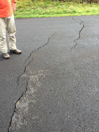 Puna residents reported to HVO geologists the recent appearance of ground cracks on a couple of roads in and around Leilani Estates. No steaming or heat were observed to originate from the cracks, and the cracks are currently still small (no more than several inches across). (image: HVO / USGS)