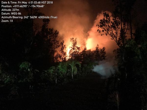 A new lava fissure commenced around 1:00 am HST on Kīlauea Volcano's lower East Rift Zone on Makamae and Leilani Streets in the Leilani Estates subdivision. Spatter was being thrown roughly 30 m (about 100 ft) high at the time of this photo. Copious amounts of sulfur dioxide gas, which should be avoided, is emitted from active fissures. The eruption is dynamic and changes could occur with little warning.