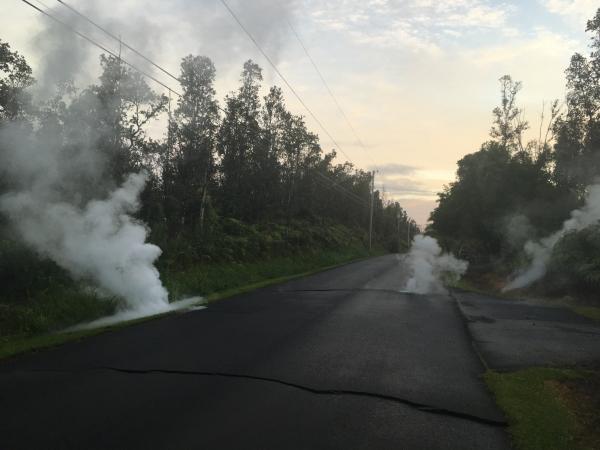 Steaming cracks at 5:57 a.m. HST in Leilani Estates subdivision, moments before a fissure opened up on Kaupili Street.