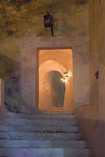 Entrance to the castle of Pirgos illuminated during the night of Good Friday
