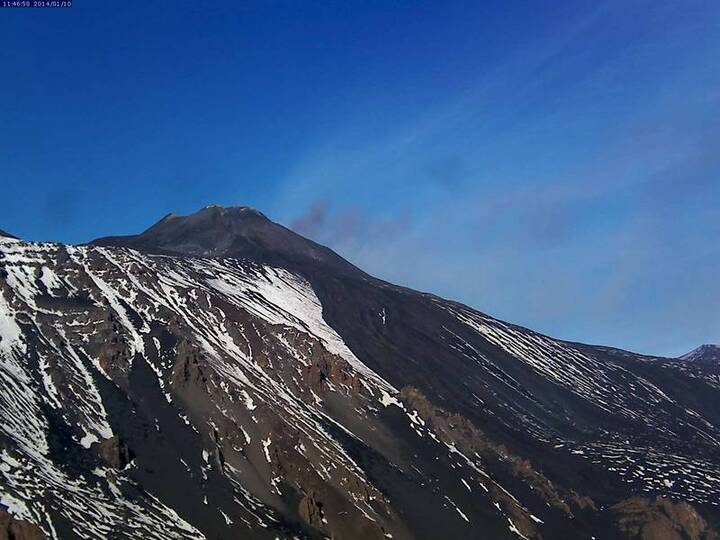 Ash plume rising from the (hidden) NE crater of Etna this morning (Etna Trekking webcam Schiena dell'Asino)