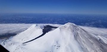 Great Sitkin volcano with the lahar traveled from the summit crater (image: Steve Rhodes AVO)