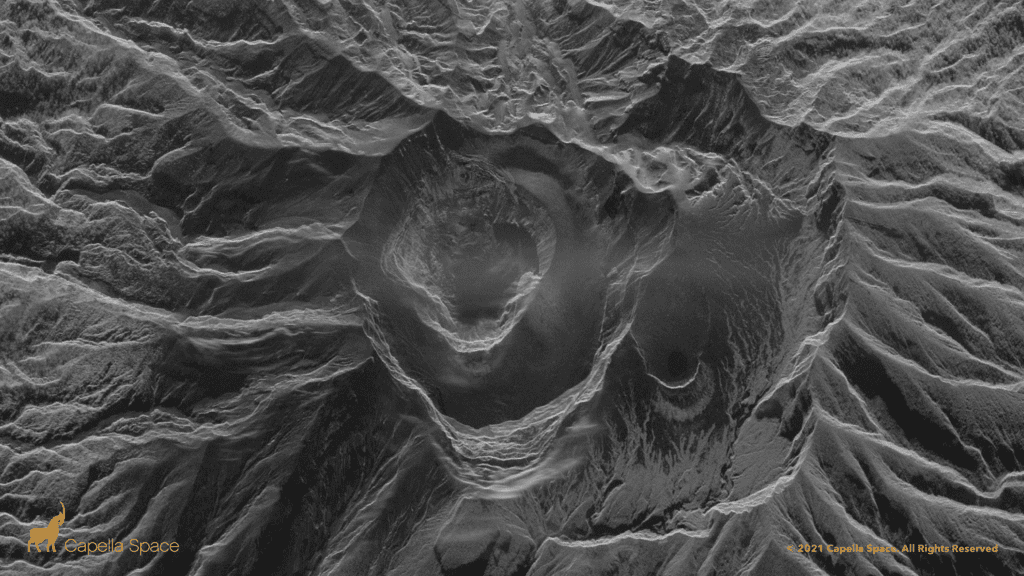 A new deep vent formed after the first two massive eruptions on 9 April visible in the satellite image (image: @capellaspace/twitter)