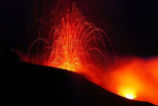 Eruption form the West crater and spattering from a vent of the central crater