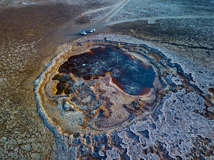 Aerial view of one of the larger acid ponds and salt deposits near Assale salt lake ad Dallol (Stefan Tommasini - January 2018)