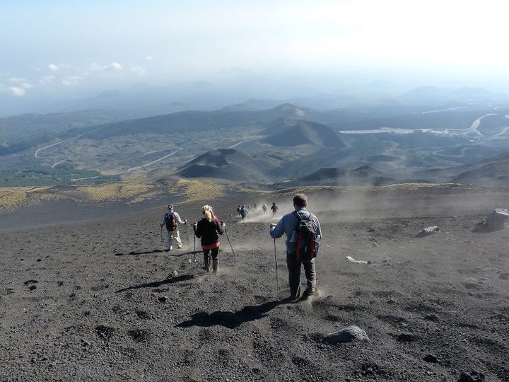 Descend through a volcanic moonscape of ash, scoria and cinder cones back to the hotel