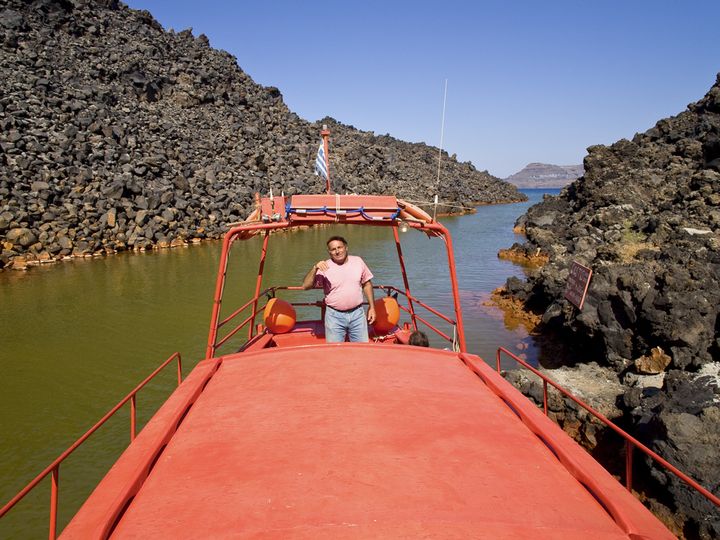 Captain Sostis in a bay with thermal water