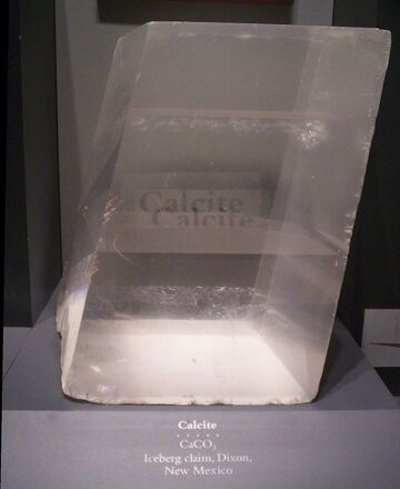 Large crystal of Calcite on display at the National Museum of Natural History in Washington, DC. With its special property of showing double refraction, it is also known as Icelandic Spar.
