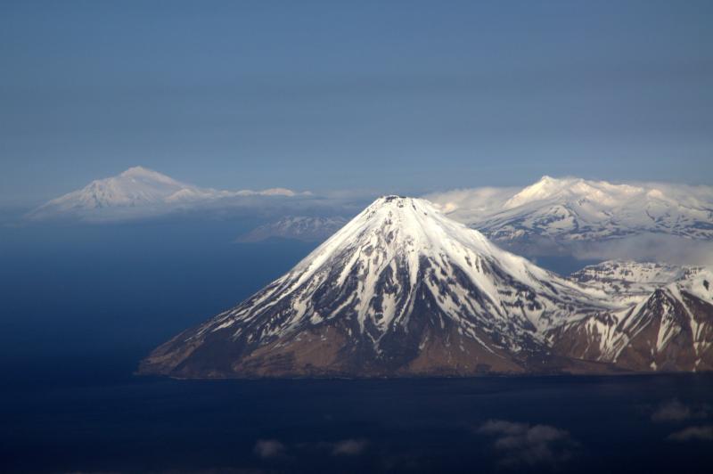 Kanaga Volcano Viewed from the west with Mt Moffet, Adak and Great Sitkin in the background (image taken May 8, 2010 by Cyrus Read, AVO/USGS)